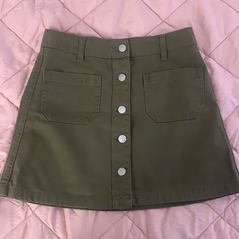 Green mini Jean skirt. Never worn